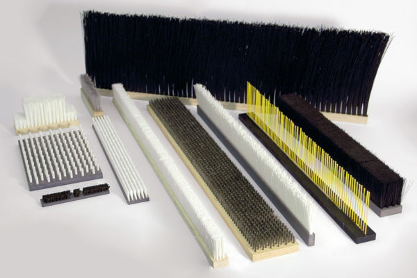 Brosses plates et brosses à bande