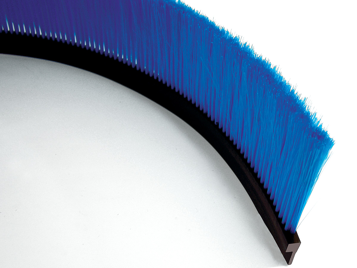 Flexible strip brushes with rubber profile