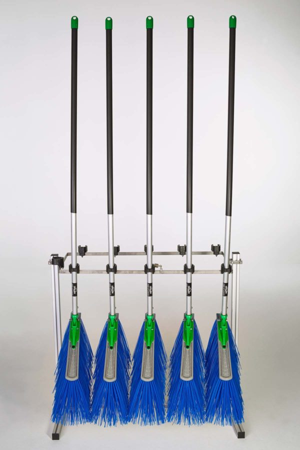 rack with brooms